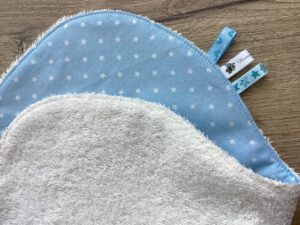 créme- babyblauw ster